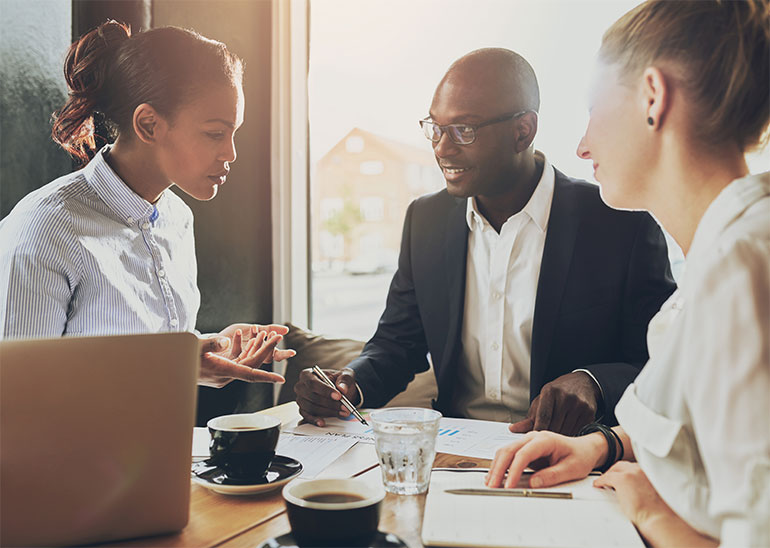 group of legal team having meeting inside a cafe